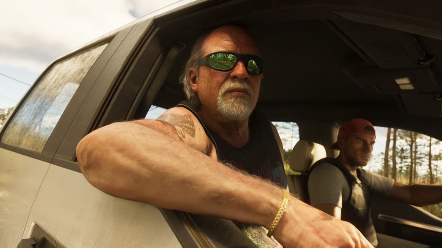 Brian Heder leaning out of a truck window in sunglasses