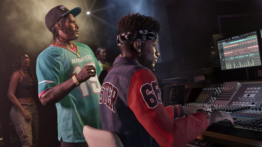 Two men working at a mixing desk in a recording studio