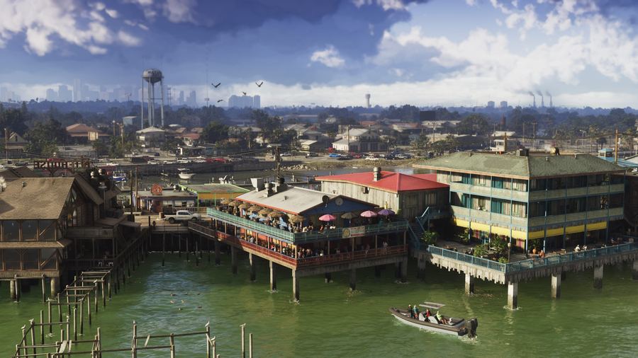 Stilt houses and boats along a wetland waterfront in daylight