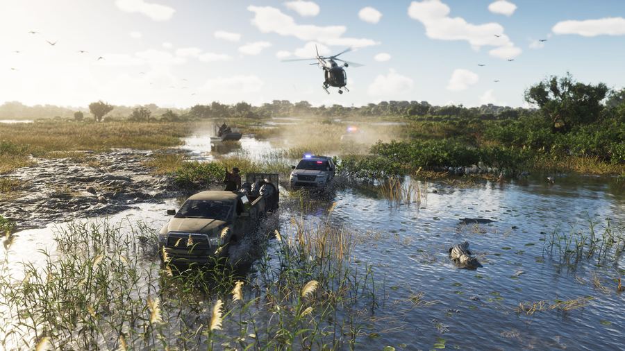 A helicopter hovering over boats in open wetland with alligators in the water