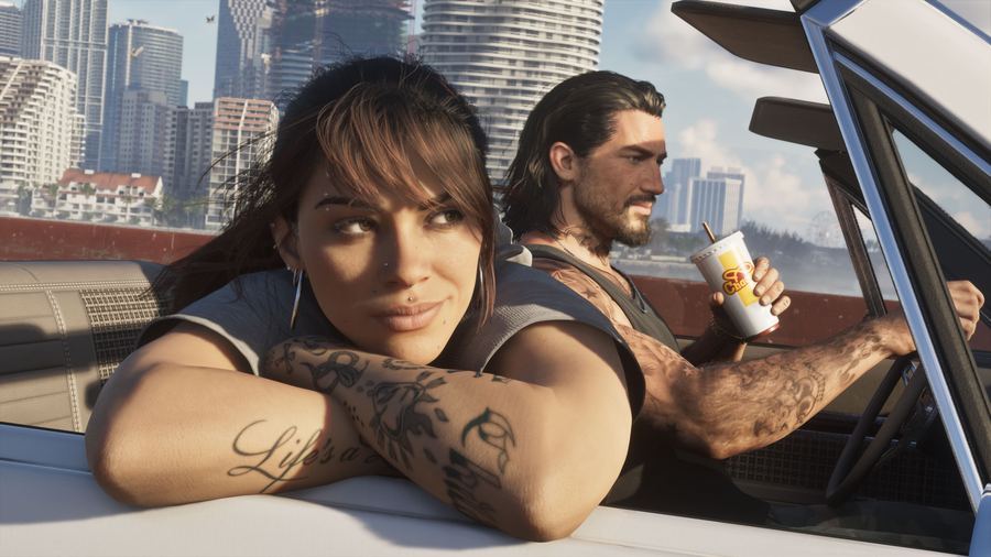Lucia and Jason relaxing together in a convertible under a bright sky