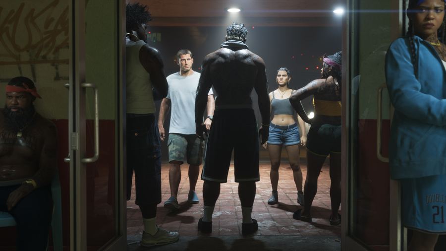 Masked robbers holding people against a wall inside a store