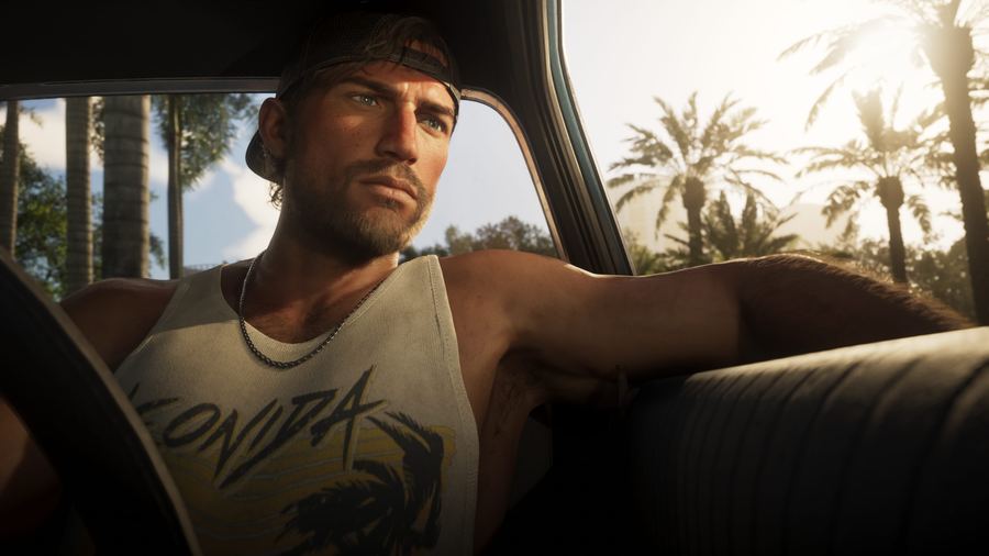 Jason Duval resting his arm out of a car window in bright Leonida daylight