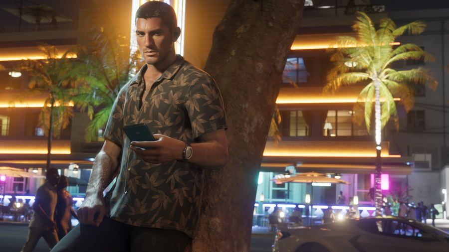 Jason Duval checking his phone outside a neon-lit Vice City storefront at night