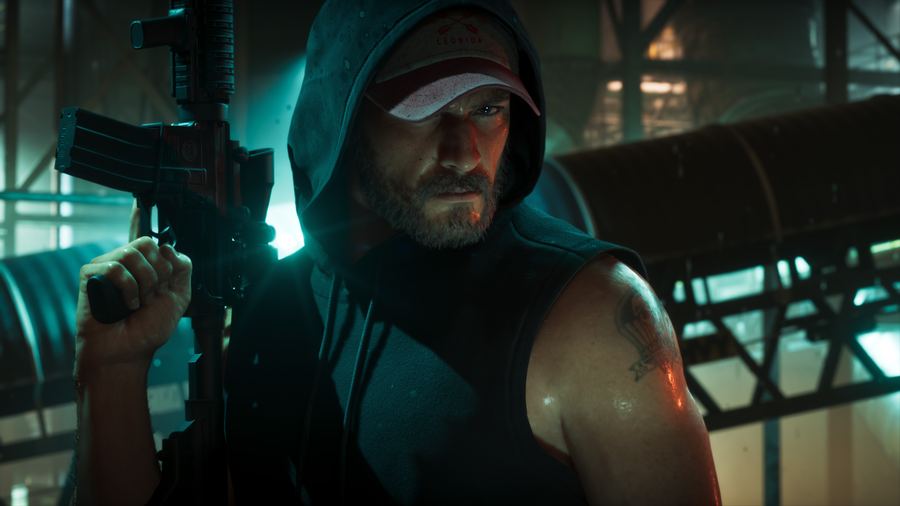 A hooded figure carrying a rifle under teal neon light at night