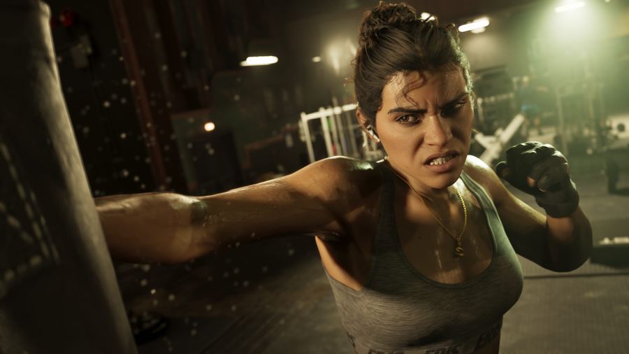 Lucia Caminos throwing a punch in a dimly lit interior