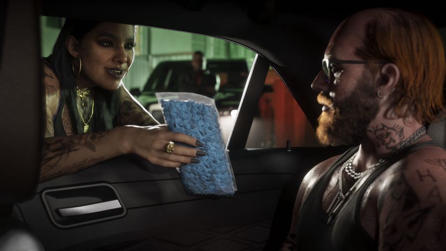 A couple eating in a parked car in daylight